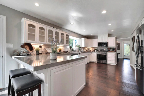 A beautiful modern white kitchen in a residential home.