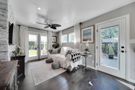 A white living room in a residential house.